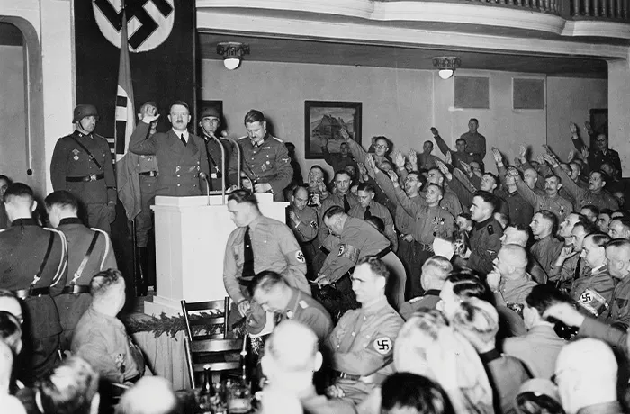 Adolf Hitler speaks at the Buergerbraeukeller beer hall in Munich on Nov. 8, 1939, just before the failed bombing attempt on his life by Georg Elser. (Heinrich Hoffmann/ullstein bild via Getty Images)