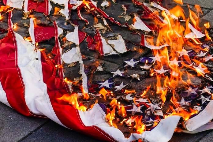 Trump advises that anyone burning American flag will be imprisoned for a year