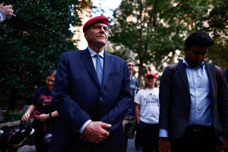 New York City Republican mayoral candidate Curtis Sliwa stands with his hands clasped.