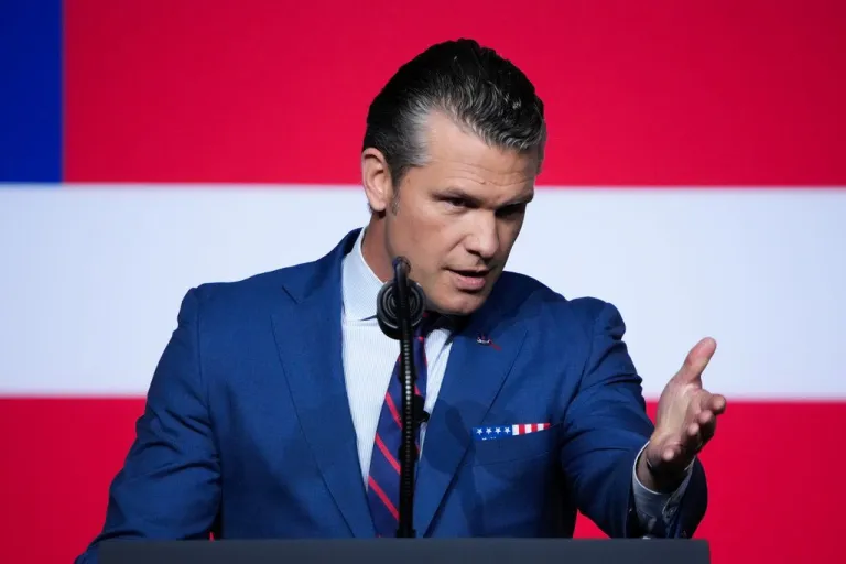 Pete Hegseth speaks at a gathering of military leaders in Virginia.