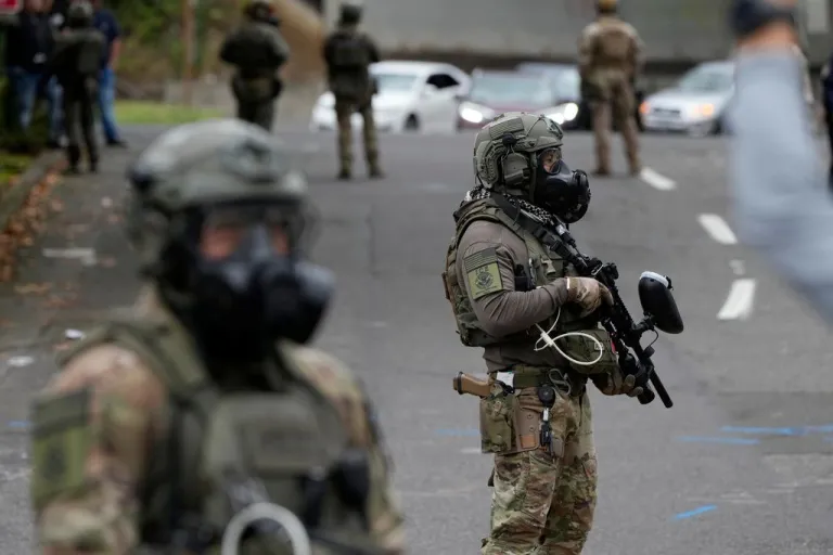 ICE agents are seen in Portland, Oregon.