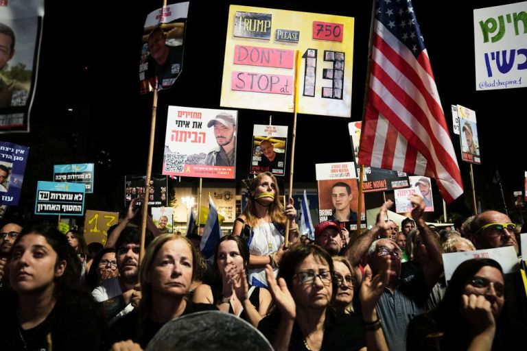 Supporters gather in Israel for the return of hostages' remains.