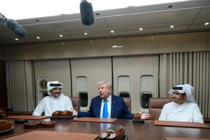 Emir of Qatar joins Trump on Air Force One during trip to Asia Emir of Qatar joins Trump on Air Force One during trip to Asia