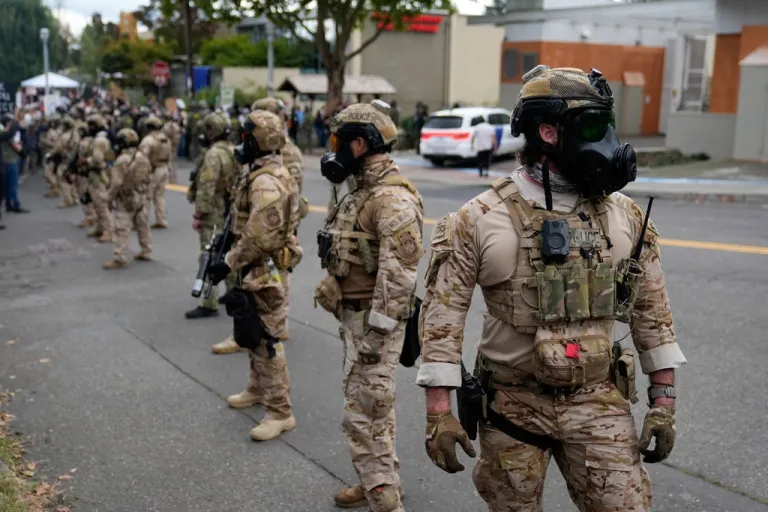 Federal officers are seen on the streets of Portland.