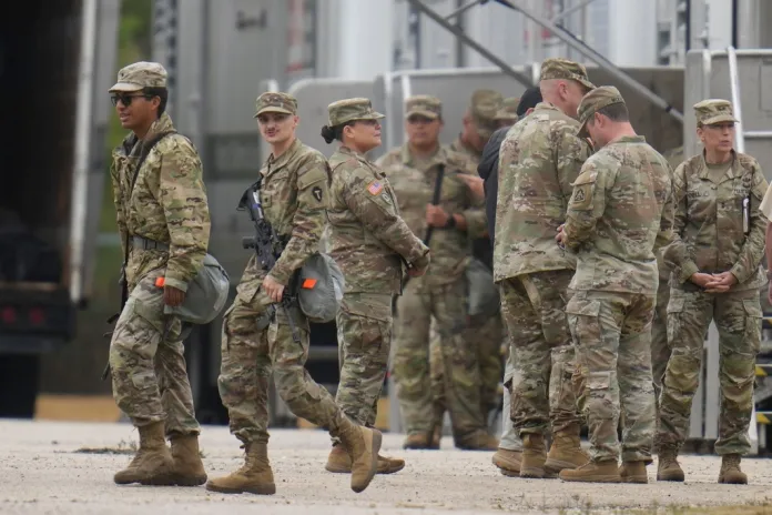 Texas National Guard members stage outside Chicago as part of Trump troop deployment