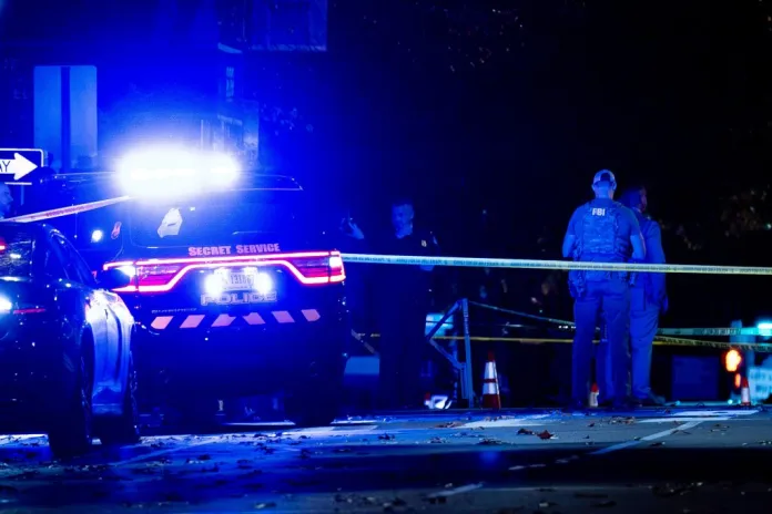 Members of law enforcement, including the U.S. Secret Service and the Washington Metropolitan Police Department, respond to a shooting of two West Virginia National Guard members.