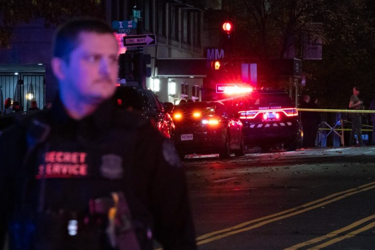 Members of law enforcement, including the U.S. Secret Service and the Washington Metropolitan Police Department, respond to a shooting of two West Virginia National Guard members.