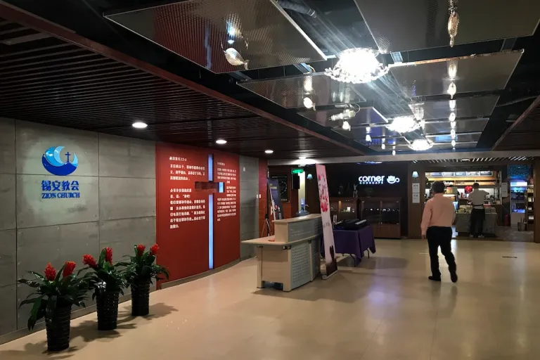 In this May 21, 2018, photo, a man walks into the Zion church in Beijing.