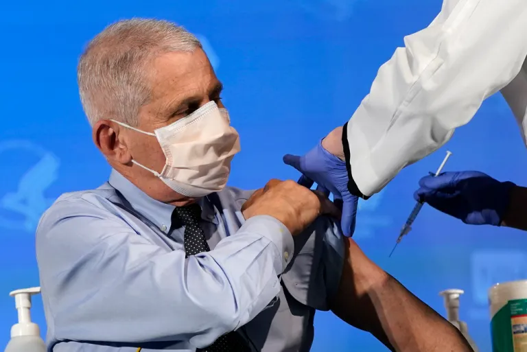 Anthony Fauci prepares to receive his first dose of the COVID-19 vaccine