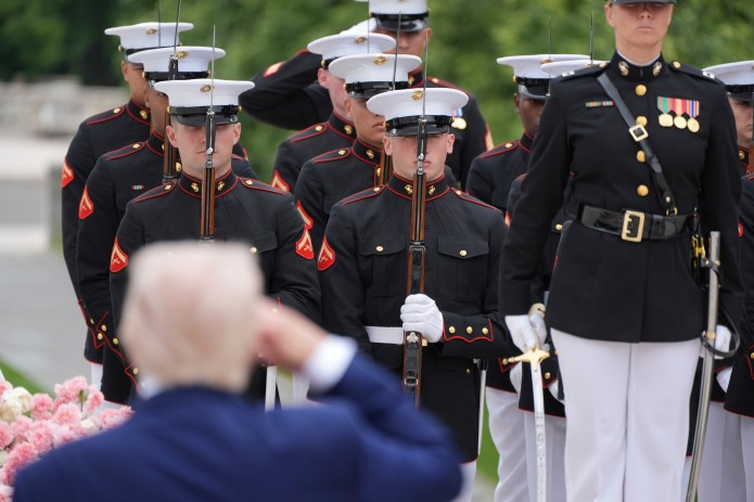President Donald Trump salutes during a Memorial Day wreath laying ceremony at Arlington National Cemetery, in Arlington, Va., Monday, May 26, 2025. (AP Photo/Jacquelyn Martin)