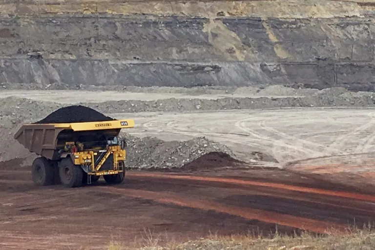 A dump truck hauling coal
