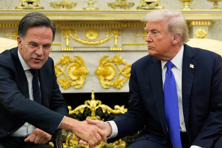 President Donald Trump shakes hands with NATO Secretary General Mark Rutte in the Oval Office of the White House, Wednesday, Oct. 22, 2025, in Washington.