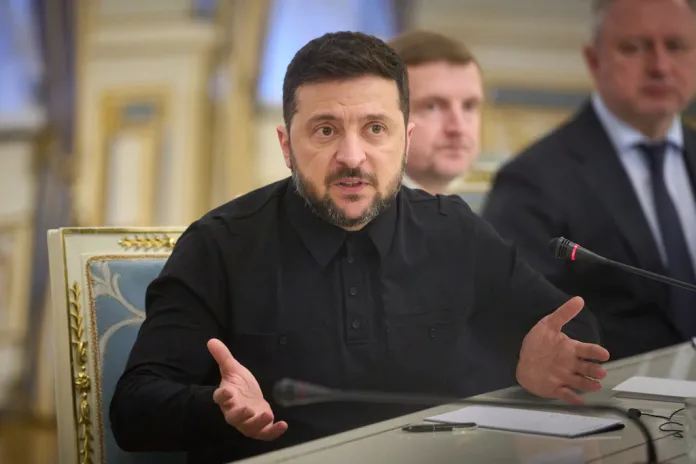 Ukrainian President Volodymyr Zelensky speaks during a meeting.