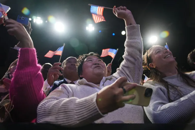 People cheer as Democrat Abigail Spanberger walks out on stage after she was declared the winner of the Virginia governor's race during an election night watch party.