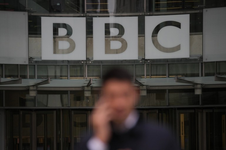 A man walks outside the BBC Headquarters in London, Monday, Nov. 10, 2025. (AP Photo/Kin Cheung)