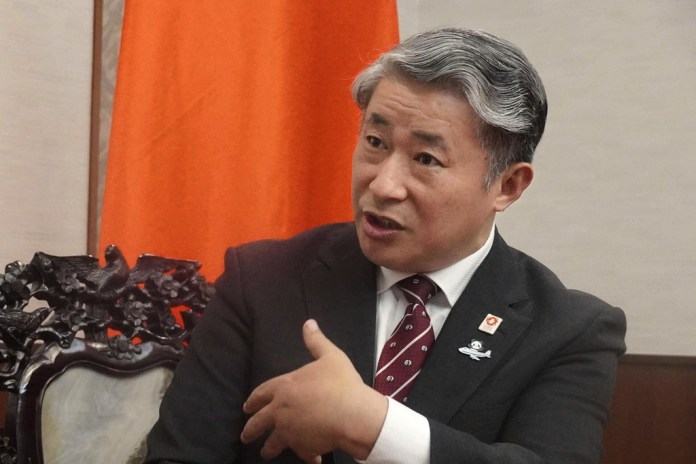 Xue Jian, Chinese consul general in Osaka, conducts an interview in Osaka, western Japan.