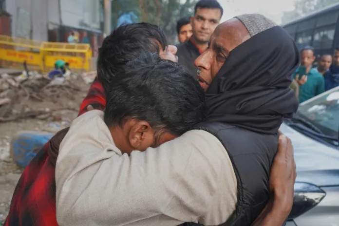 Family members of a victim of Monday's car explosion near the historic Red Fort break down at a hospital in New Delhi, India, Tuesday, Nov. 11, 2025.