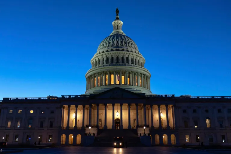 The U.S. Capitol is seen on a sunset a day before the House prepares to vote on a bill to reopen the government at the Capitol in Washington, Tuesday, Nov. 11, 2025