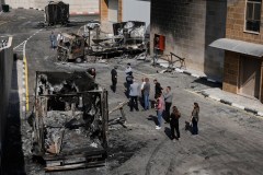 Israeli president condemns settler mob that burned Palestinian factories and vehicles