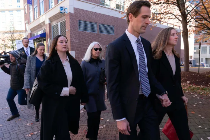 Former FBI Director James Comey's family leaves the federal courthouse in Alexandria, Virginia.