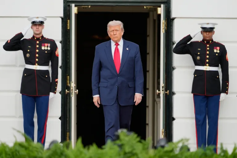 President Donald Trump waits to welcome Saudi Arabia's Crown Prince Mohammed bin Salman to the White House, Tuesday, Nov. 18, 2025, in Washington. (AP Photo/Mark Schiefelbein)
