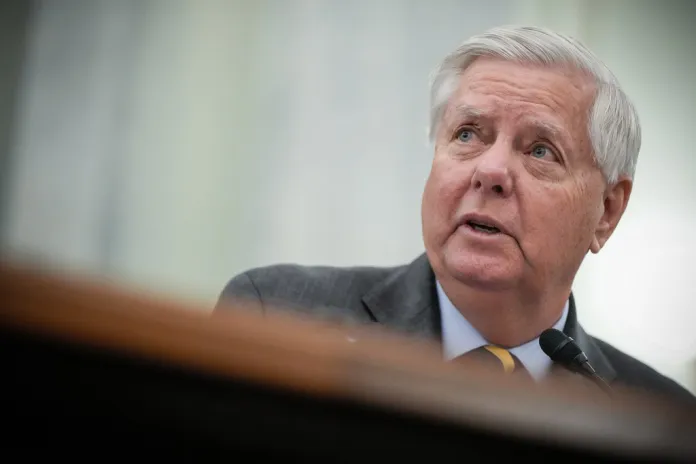 Sen. Lindsey Graham, R-S.C., introduces Adm. Kevin Lunday, acting commandant of the U.S. Coast Guard, during a Senate Commerce, Science and Transportation Committee hearing on the nomination Lunday for Commandant of the Coast Guard, Wednesday, Nov. 19, 2025, on Capitol Hill in Washington