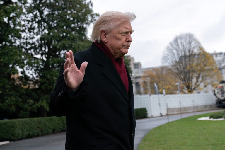 President Donald Trump waves to reporters as he departs from the South Lawn of the White House, Saturday, Nov. 22, 2025, in Washington, en route to Joint Base Andrews