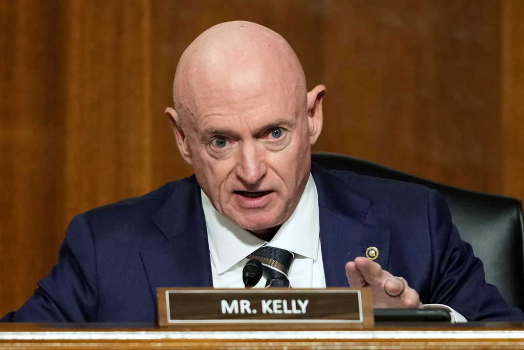 Mark Kelly stands for illegal immigrants but sits for legal American citizens