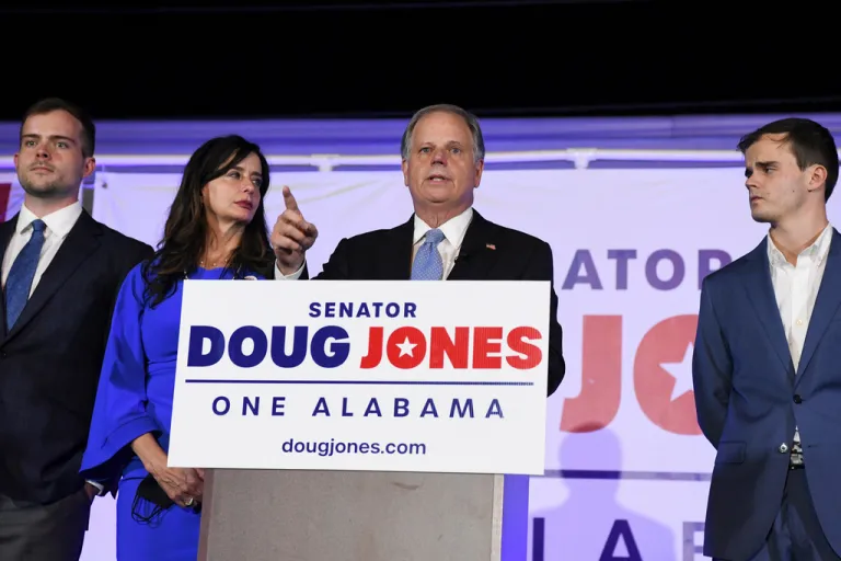 FILE - Sen. Doug Jones delivers his concession speech