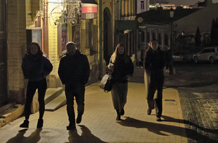 An unlit street in Kyiv following Russian missile and drone attacks on Ukraine’s power grid, Nov. 25, 2025.  (Roman Pilipey/AFP/Getty)