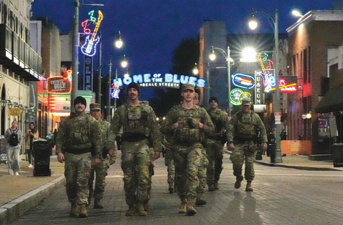 National Guard troops conduct a community safety patrol on Beale Street on Oct. 24 in Memphis, Tennessee. (George Walker IV/AP)