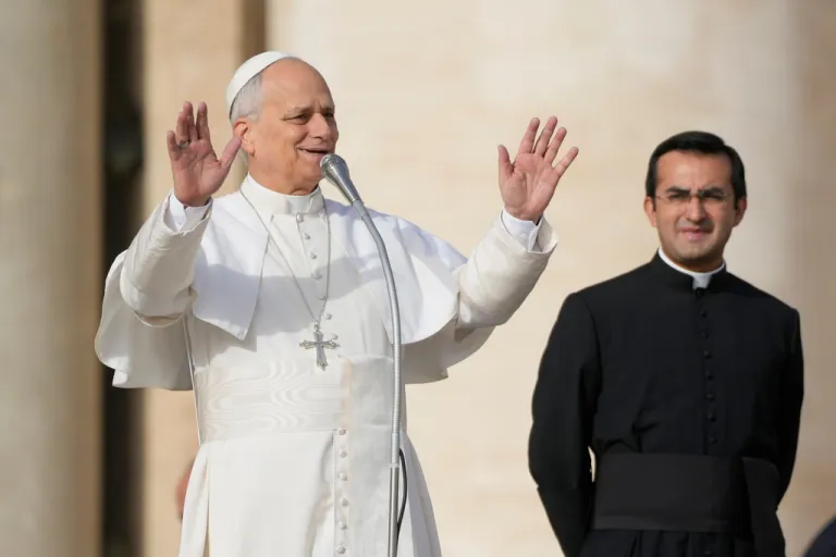 Pope Leo XIV waves to faithful before presiding over special mass for the Jubilee of the poor, in St. Peter's Square at The Vatican, Sunday, Nov.16, 2025. (AP Photo/Gregorio Borgia)