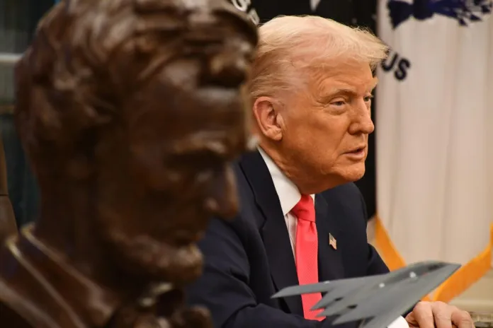 President Donald Trump speaks to Washington Examiner columnist Salena Zito in the Oval Office.