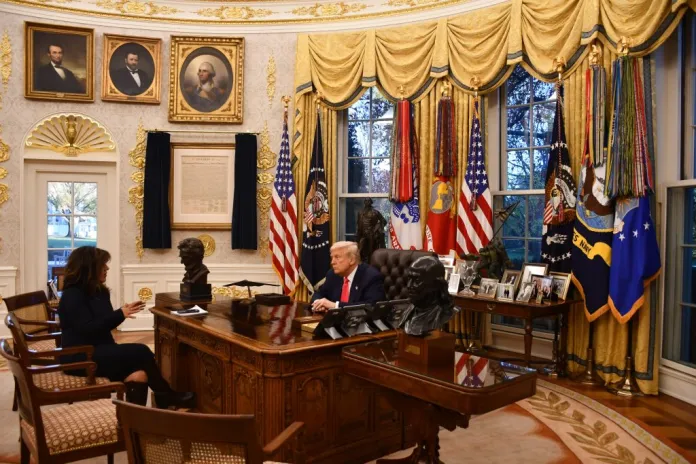 President Donald Trump speaks to Washington Examiner columnist Salena Zito in the Oval Office.
