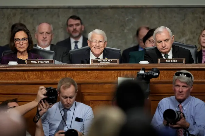 Sen. Deb Fischer (R-NE), left, Committee chairman Sen. Roger Wicker (R-MS), center, and Sen. Jack Reed (D-RI), the ranking member.