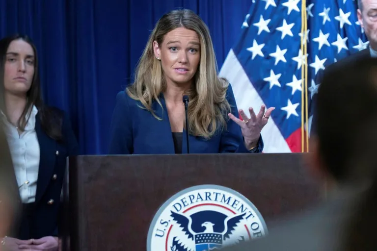 DHS Assistant Secretary Tricia McLaughlin speaks from the podium.