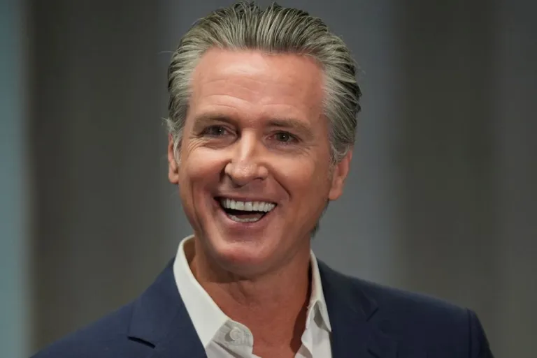 Gov. Gavin Newsom (D-CA) smiles.