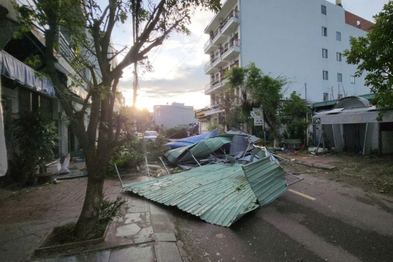 8 of 8 | Debris sits on a road in Gai Lai, Vietnam, on Friday, Nov. 7, 2025 after Typhoon Kalmaegi lashed the country with fierce winds and torrential rains. (Sy Thang/VNA via AP)