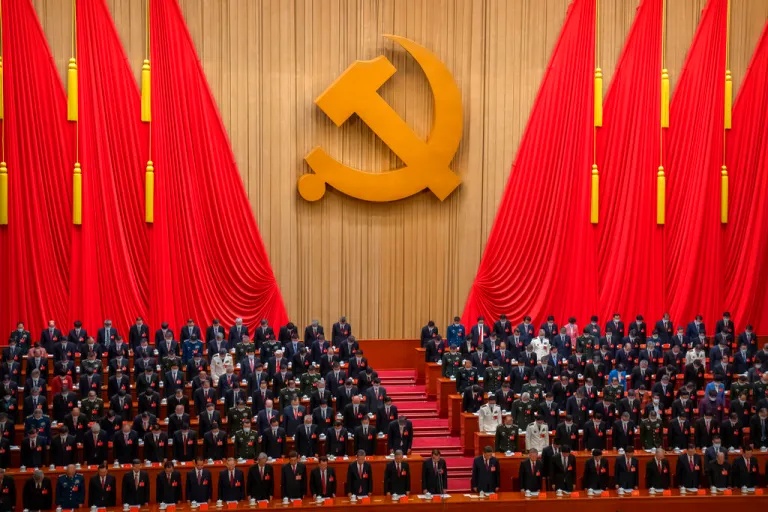Delegates stand for a moment of silence during the opening ceremony of the 20th National Congress of China's ruling Communist Party at the Great Hall of the People in Beijing, China.