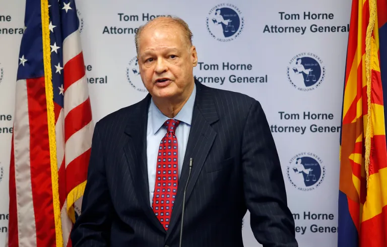 Then-Arizona Attorney General Tom Horne talks to the media, Oct. 17, 2014, in Phoenix. On Tuesday, March 5, 2024, a Maricopa County Superior Court judge dismissed a lawsuit by Horne, now Arizona's superintendent of public instruction, challenging programs that some school districts use to teach non-English speaking students. Horne said he will appeal the ruling.
