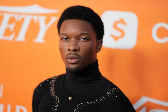 D4vd poses for photos at a Variety magazine event.