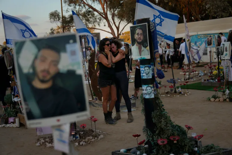 People visit the site of the Nova music festival, where hundreds of revelers were killed and abducted by Hamas and taken into Gaza