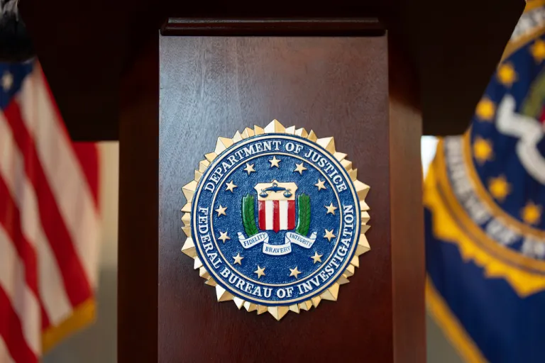 An FBI seal on a podium.