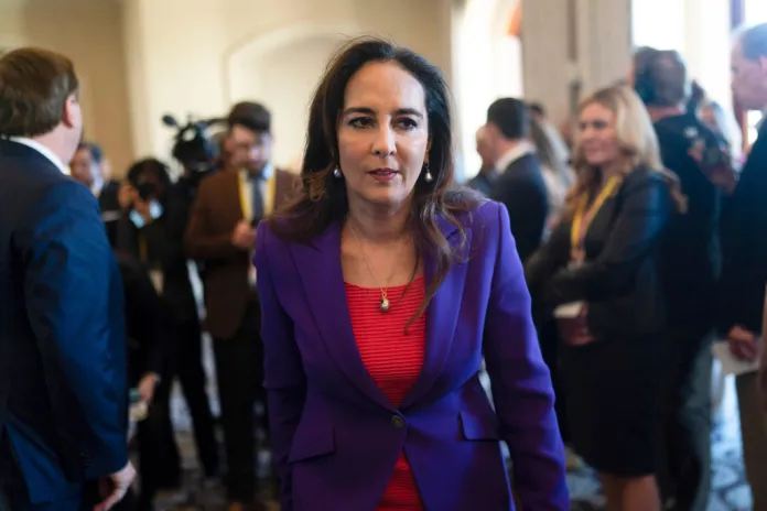 FILE - Harmeet Dhillon walks through a hallway after talking to reporters at the Republican National Committee winter meeting in Dana Point, Calif., Jan. 27, 2023. (AP Photo/Jae C. Hong, File)