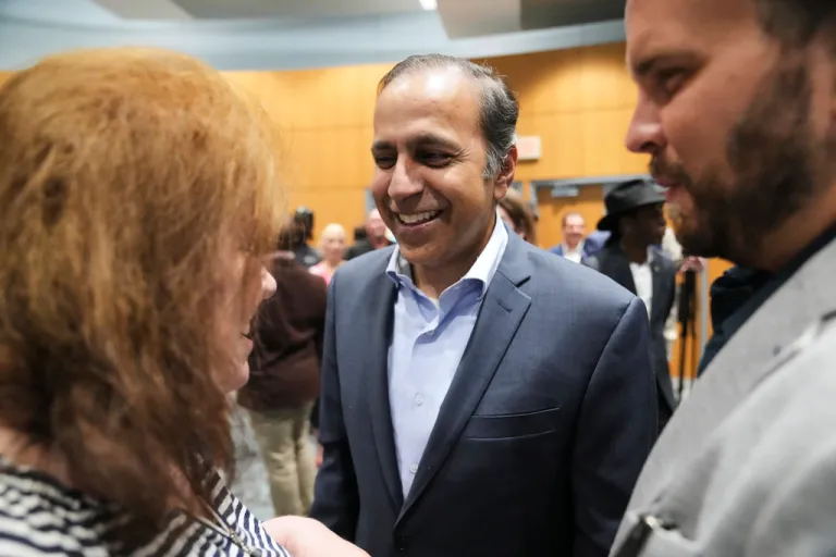 Rep. Raja Krishnamoorthi, D-Ill., mingles following a press conference with other Democratic members of Congress and Texas House Democrats at the Democratic Party in Warrenville, Ill., Monday, Aug. 4, 2025.