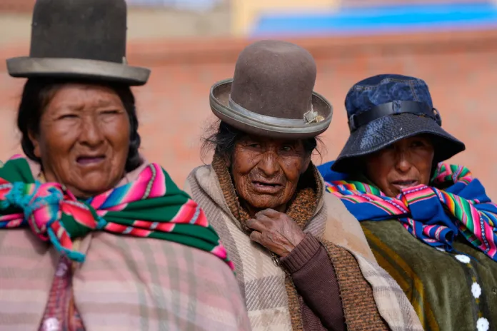 Bolivian citizens wait to vote.