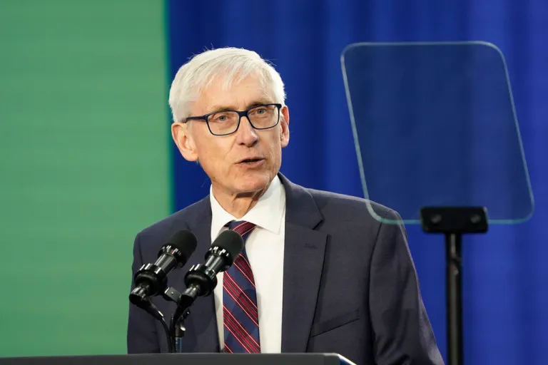 Wisconsin Gov. Tony Evers speaks prior to President Joe Biden's appearance at an event about canceling student debt, Monday, April 8, 2024, at the Madison Area Technical College Truax campus in Madison, Wis.