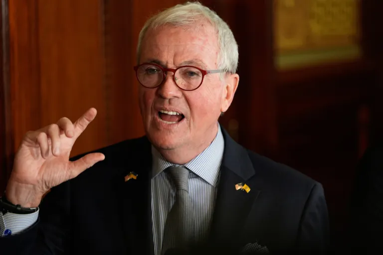 New Jersey Governor Phil Murphy talks to reporters in Trenton, N.J., Wednesday, Nov. 5, 2025.