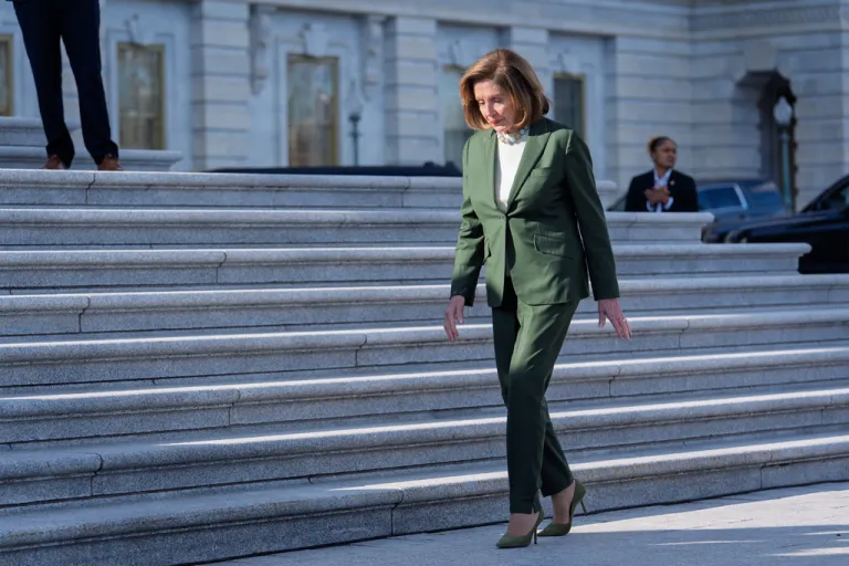 Speaker Emerita Nancy Pelosi, D-Calif., who has announced she will not seek reelection to the U.S. House, walks to join fellow Democrats at an event on the health care fight on the steps of the House before votes to end the government shutdown, at the Capitol in Washington, Wednesday, Nov. 12, 2025.