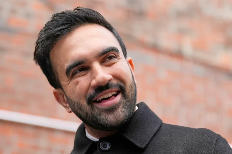 New York Mayor-elect Zohran Mamdani talks to reporters at a news conference.